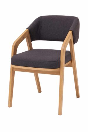 Dubová stolička Emily spája masívne dubové drevo, elegantné tmavosivé čalúnenie a nadčasový dizajn. Ergonomicky tvarované operadlo s opierkami zaisťuje vysoký komfort pri každodennom sedení. Vďaka pevnej konštrukcii s nosnosťou 130 kg je ideálna nielen do jedálne, ale aj do pracovne, kancelárie či štýlových komerčných priestorov.