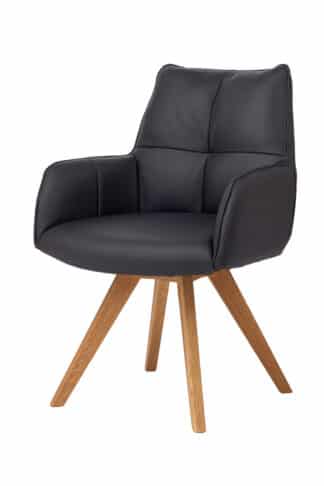 Otočné dubové kresielko Amber kombinuje pevnosť dubového masívu s elegantným čiernym koženkovým poťahom, ktorý je príjemný na dotyk a ľahko sa udržiava. Vďaka čiastočne otočnému mechanizmu si pohodlne nastavíte optimálnu pozíciu pri sedení. Ideálna voľba pre moderný domov aj pracovný priestor, kde vynikne tak dizajn, ako aj funkčnosť.